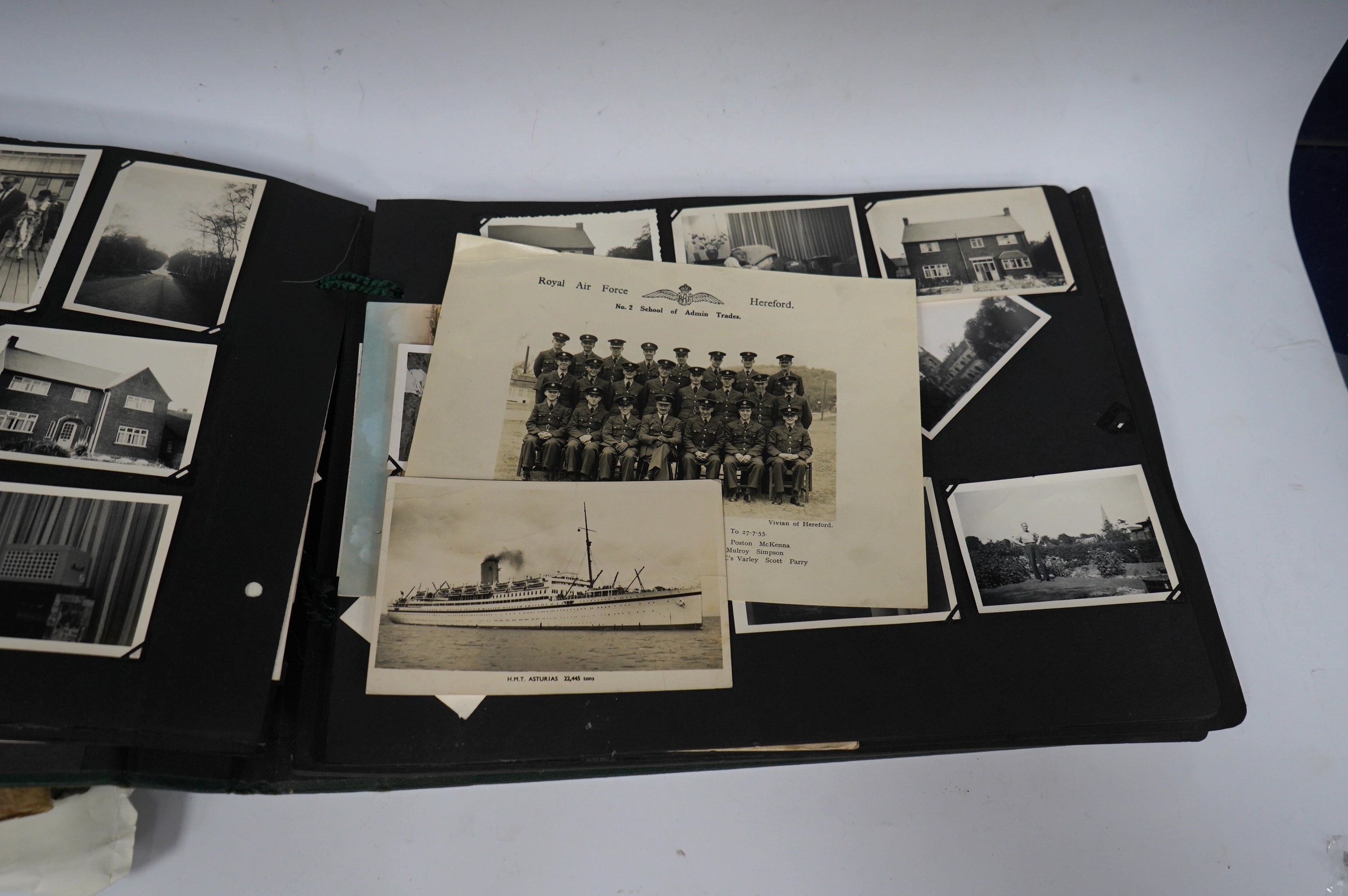 Two 1940s family photograph albums, including a few 1930s postcards, two photos of RAF aircraft, as well as military photographs of soldiers in uniform, etc. Condition - poor to fair